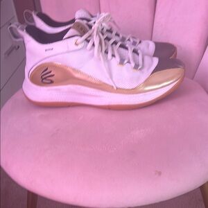 Under Armour White and Gold Sneakers with Streamlined Design